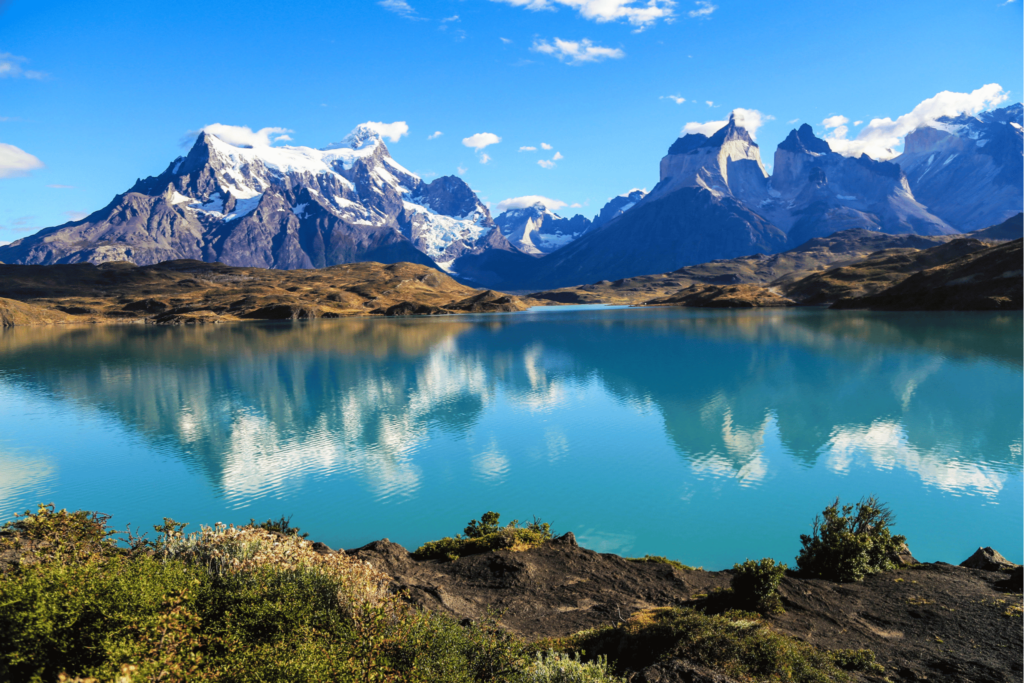 luxury argentina picture of large lake with mountains in background